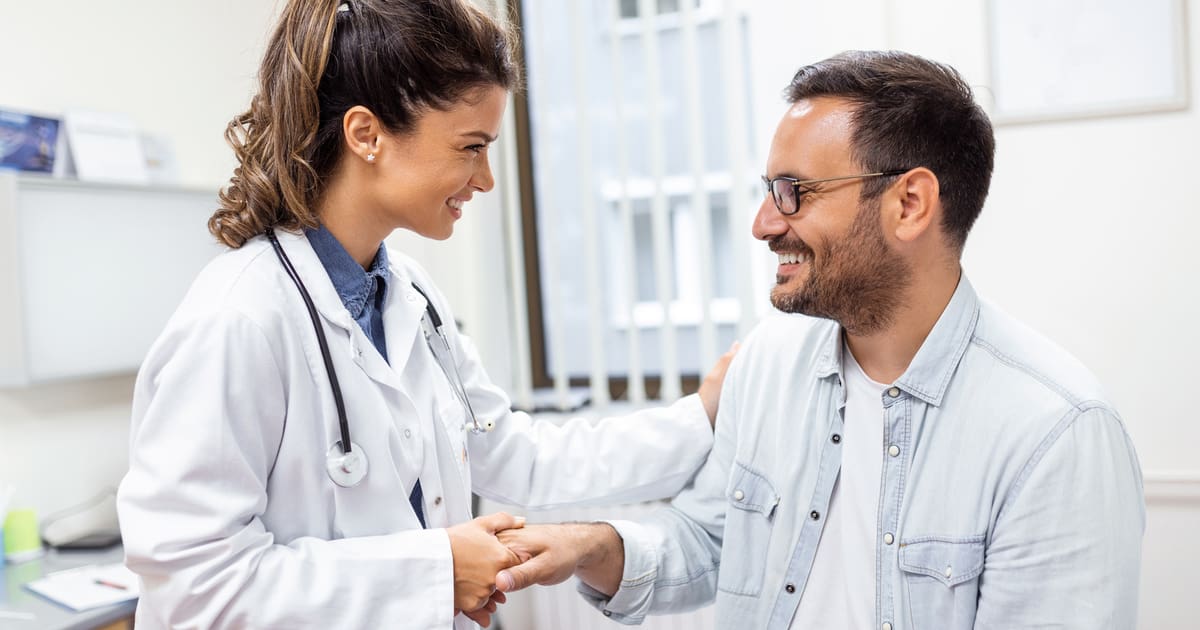 Woman doctor with patient